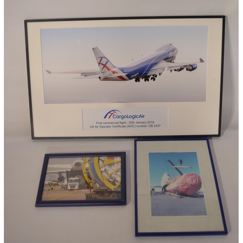 13 - Collection of Volga-Dnepr framed pictures and prints (largest example 141x89cm) and an inhouse produ... 