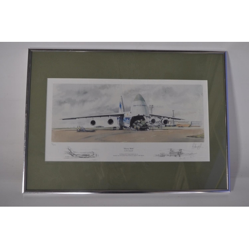 13 - Collection of Volga-Dnepr framed pictures and prints (largest example 141x89cm) and an inhouse produ... 