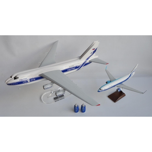 6 - Two incomplete 1/100 scale desktop display models to include half and half 747-8F Cargo Logic Air/An... 