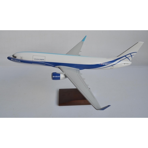 6 - Two incomplete 1/100 scale desktop display models to include half and half 747-8F Cargo Logic Air/An... 