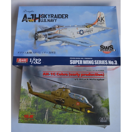 28 - Two unbuilt 1/32 scale Vietnam War era plastic model kits to include a Zoukei-Mura Douglas A-1H Skyr... 