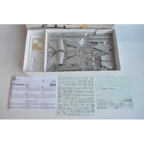 35 - Two 1/32 scale plastic model kits to include an Italeri Lockheed F-104A/C Starfighter and an ICM Bel... 