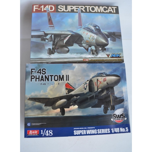 37 - Two modern highly detailed 1/48 US Navy fighter model kits to include an AMK Grumman F-14D Super Tom... 