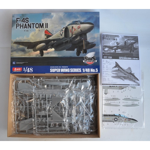 37 - Two modern highly detailed 1/48 US Navy fighter model kits to include an AMK Grumman F-14D Super Tom... 