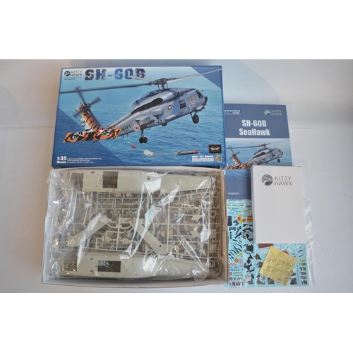 44 - Three unstarted 1/35 scale model kits to include a Kitty Hawk Sikorsky SH-60B Sea Hawk, Takom AH-64D... 