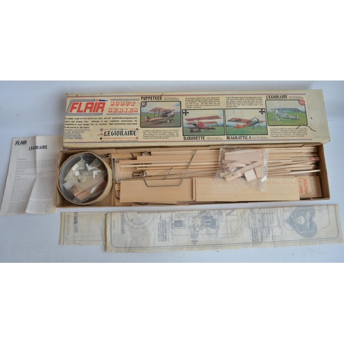 52 - Two unbuilt balsa wood radio controlled model aircraft kits to include a Flair Scout Series Legionai... 