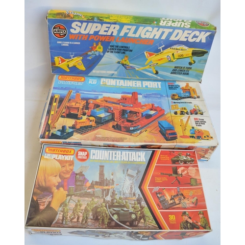 60 - Three boxed vintage model playsets to include an Airfix Super Flight Deck and Matchbox Counter-Attac... 