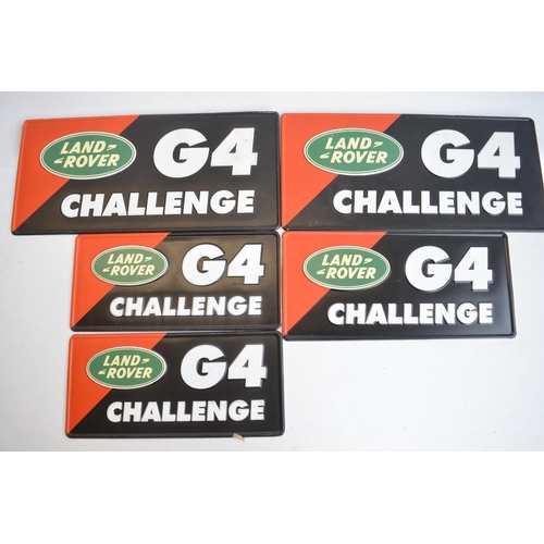 64 - Land Rover G4 Challenge collection to include 5x pressed relief text metal vehicle plates, adhesive ... 