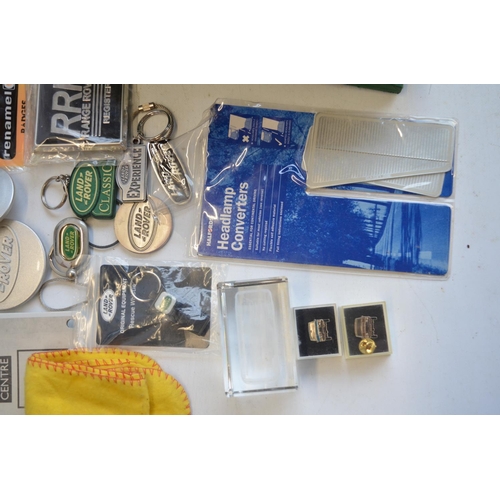 67 - Collection of Land Rover and Range Rover ephemera to include key rings, playing cards, tyre inflator... 