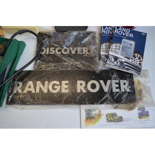 67 - Collection of Land Rover and Range Rover ephemera to include key rings, playing cards, tyre inflator... 