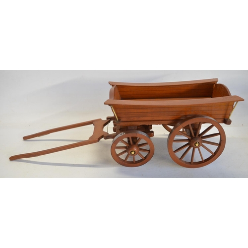 75 - Collection of attractive large scale wooden cart models with metal rimmed wheels, largest examples a... 