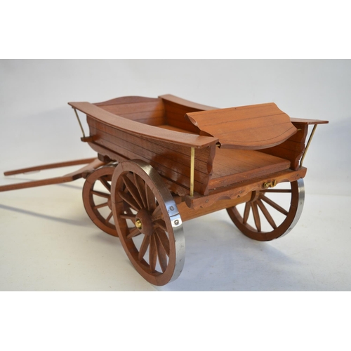 75 - Collection of attractive large scale wooden cart models with metal rimmed wheels, largest examples a... 