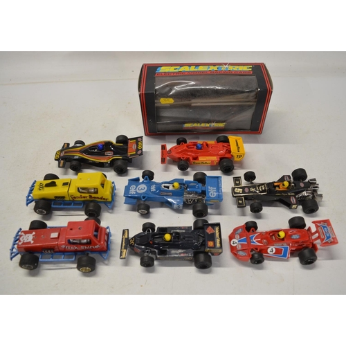 78 - Collection of playworn C1980's Scalextric including seven cars (one boxed) and a quantity of track, ... 