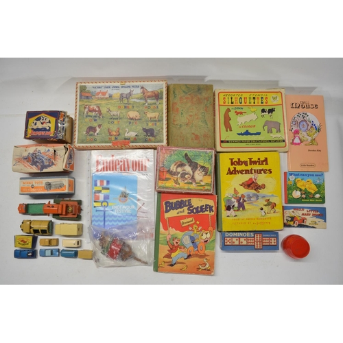 79 - Collection of vintage toys to include games, puzzles, books, vehicle models including a boxed Fordso... 