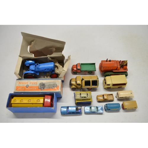 79 - Collection of vintage toys to include games, puzzles, books, vehicle models including a boxed Fordso... 