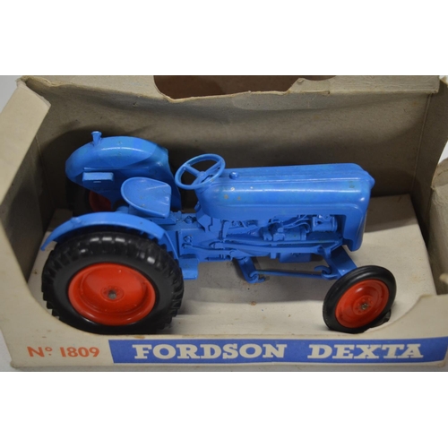 79 - Collection of vintage toys to include games, puzzles, books, vehicle models including a boxed Fordso... 