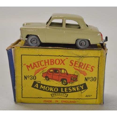 79 - Collection of vintage toys to include games, puzzles, books, vehicle models including a boxed Fordso... 