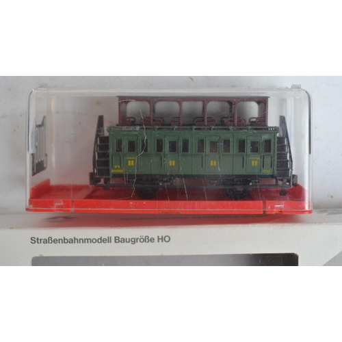 86 - Collection of bus and tram models, mostly diecast 1/76 scale from EFE, Corgi etc, also included moto... 