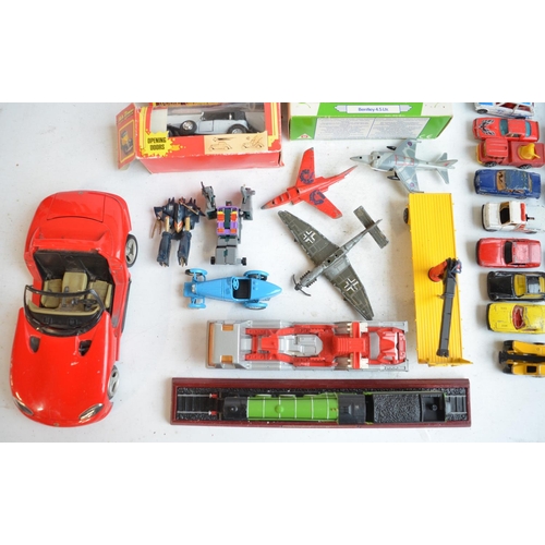 95 - Collection of mostly unboxed playworn model vehicles and a Matchbox carry case with vehicles, all A/... 