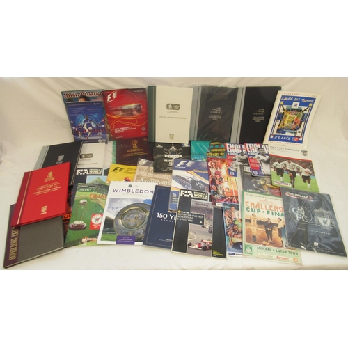 214 - Mixed collection of 1960s-2010s sports programmes in hardback and paperback to inc. Football predomi... 