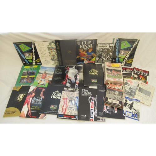 214 - Mixed collection of 1960s-2010s sports programmes in hardback and paperback to inc. Football predomi... 