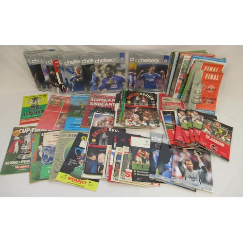 214 - Mixed collection of 1960s-2010s sports programmes in hardback and paperback to inc. Football predomi... 