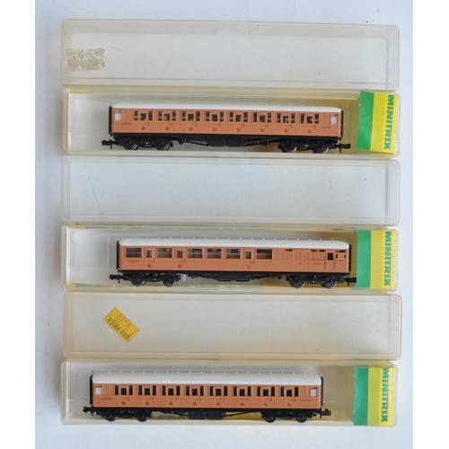 108 - Collection of N gauge passenger coaches from Graham Farish and Minitrix plus goods wagons from Dapol... 