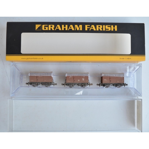 108 - Collection of N gauge passenger coaches from Graham Farish and Minitrix plus goods wagons from Dapol... 