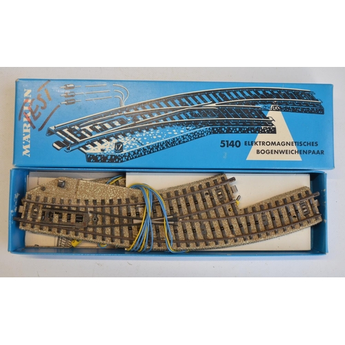 111 - Collection of Marklin 3 rail HO gauge track including boxed packs, also included empty track boxes, ... 