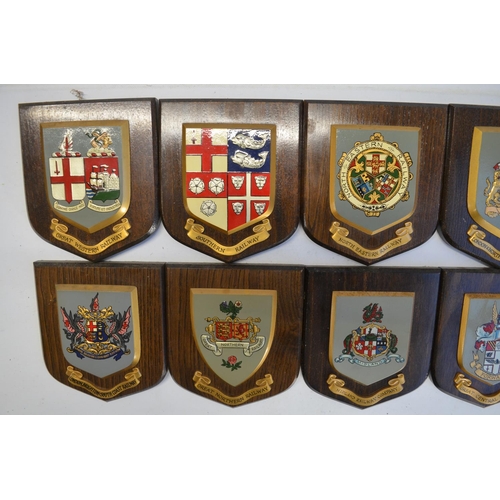 130A - Collection of ten wall mounted railway company plaques by York Insignia Limited, a porters cap badge... 