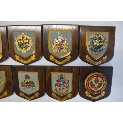 130A - Collection of ten wall mounted railway company plaques by York Insignia Limited, a porters cap badge... 