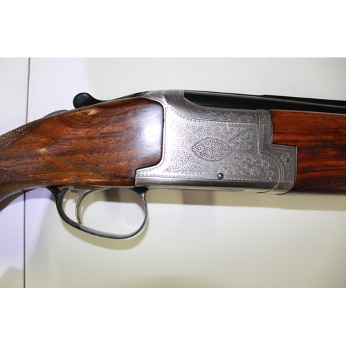 461 - Laurona Over-Under 12B Shotgun, Single trigger ejector, with multi-chokes, Serial no. S18514, Length... 