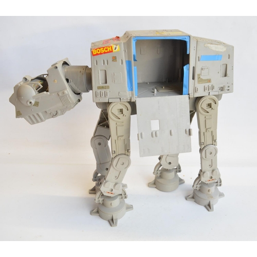 96A - Collection of mostly Star Wars action figures and models to include an AT-AT, Millennium Falcon etc.... 