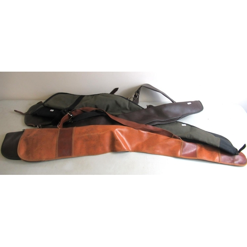 432 - Wool-lined real leather gun slip, together with two leather gun slips with straps in good condition ... 