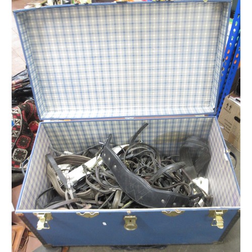 430B - Mixed collection of Horse bridle pieces and leathers in a large blue travel box