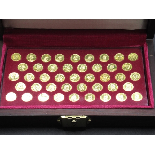  A cased set of forty-three 22ct gold medallions by John Pinches, 'Kings & Queens of England', each w... 