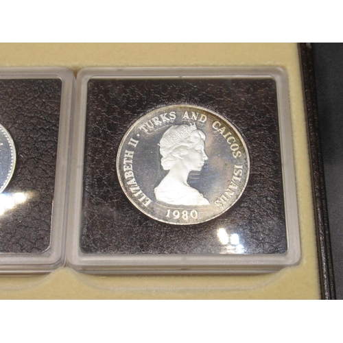 77 - Turks & Caicos Islands 1980 4 coin encapsulated set cont. 100 Crown Gold Proof Coin, 20 Crown Proof ... 