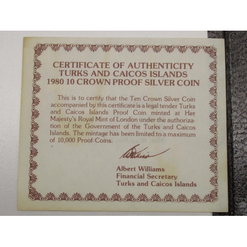 77 - Turks & Caicos Islands 1980 4 coin encapsulated set cont. 100 Crown Gold Proof Coin, 20 Crown Proof ... 