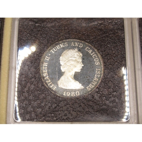 77 - Turks & Caicos Islands 1980 4 coin encapsulated set cont. 100 Crown Gold Proof Coin, 20 Crown Proof ... 