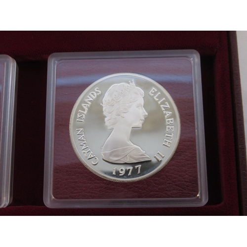 78 - The Cayman Islands silver queens collection 1977, a cased set of 6 sterling silver coins, some tarni... 