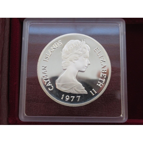 78 - The Cayman Islands silver queens collection 1977, a cased set of 6 sterling silver coins, some tarni... 