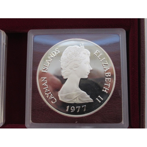 78 - The Cayman Islands silver queens collection 1977, a cased set of 6 sterling silver coins, some tarni... 