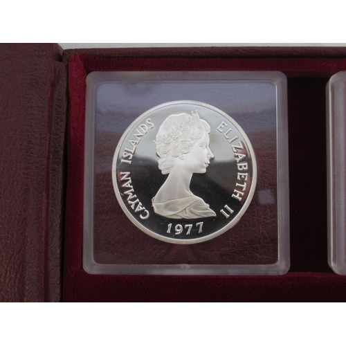 78 - The Cayman Islands silver queens collection 1977, a cased set of 6 sterling silver coins, some tarni... 