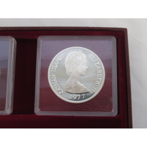 78 - The Cayman Islands silver queens collection 1977, a cased set of 6 sterling silver coins, some tarni... 