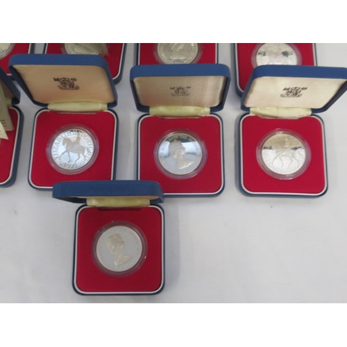 87 - Royal Mint - 16 1977 Queens Jubilee Silver Proof Crowns, 12 with Certificates, 4 lacking, predominan... 