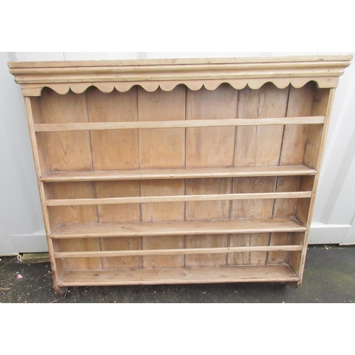 1323 - Victorian stripped pine three tier plate rack with moulded cornice, W126cm h112cm