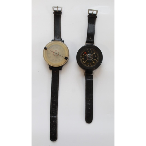 1354 - Two WWII Luftwaffe pilots wrist compass. Bakelite bodies Ref' number Fl 23235. Leather straps, both ... 