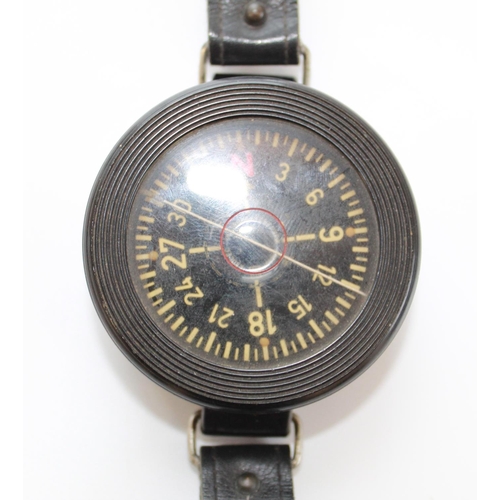 1354 - Two WWII Luftwaffe pilots wrist compass. Bakelite bodies Ref' number Fl 23235. Leather straps, both ... 