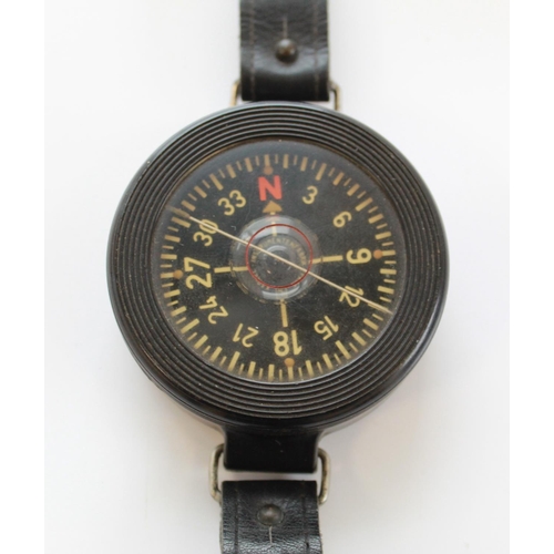 1354 - Two WWII Luftwaffe pilots wrist compass. Bakelite bodies Ref' number Fl 23235. Leather straps, both ... 