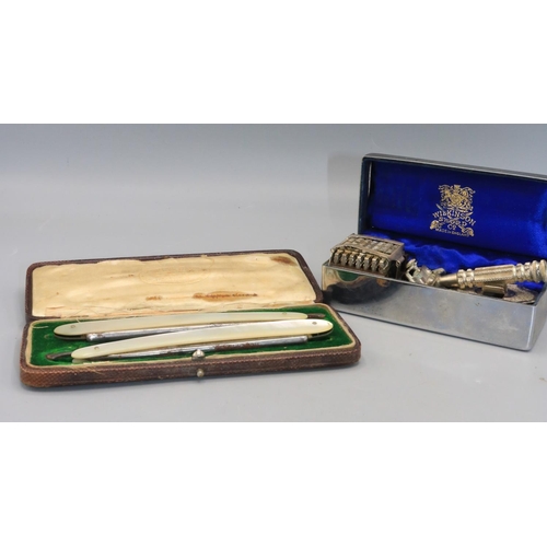 725 - Pair of M. Kindal mother of pearl straight razors and Wilkinson Sword seven day razor set in metal c... 